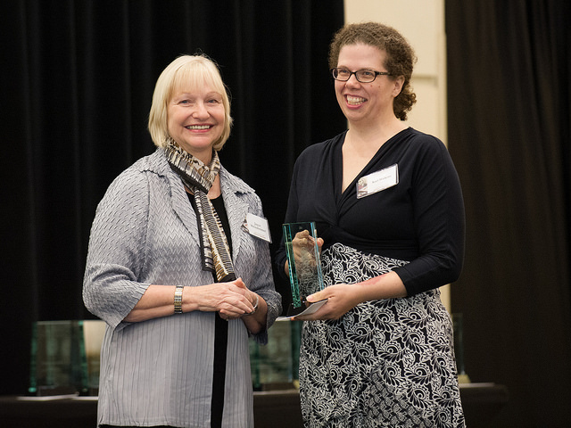 <span style="font-size:10px"> Dr. Watkins receives her award </span>